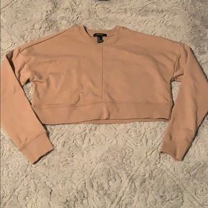 Tan colored long sleeve shirt